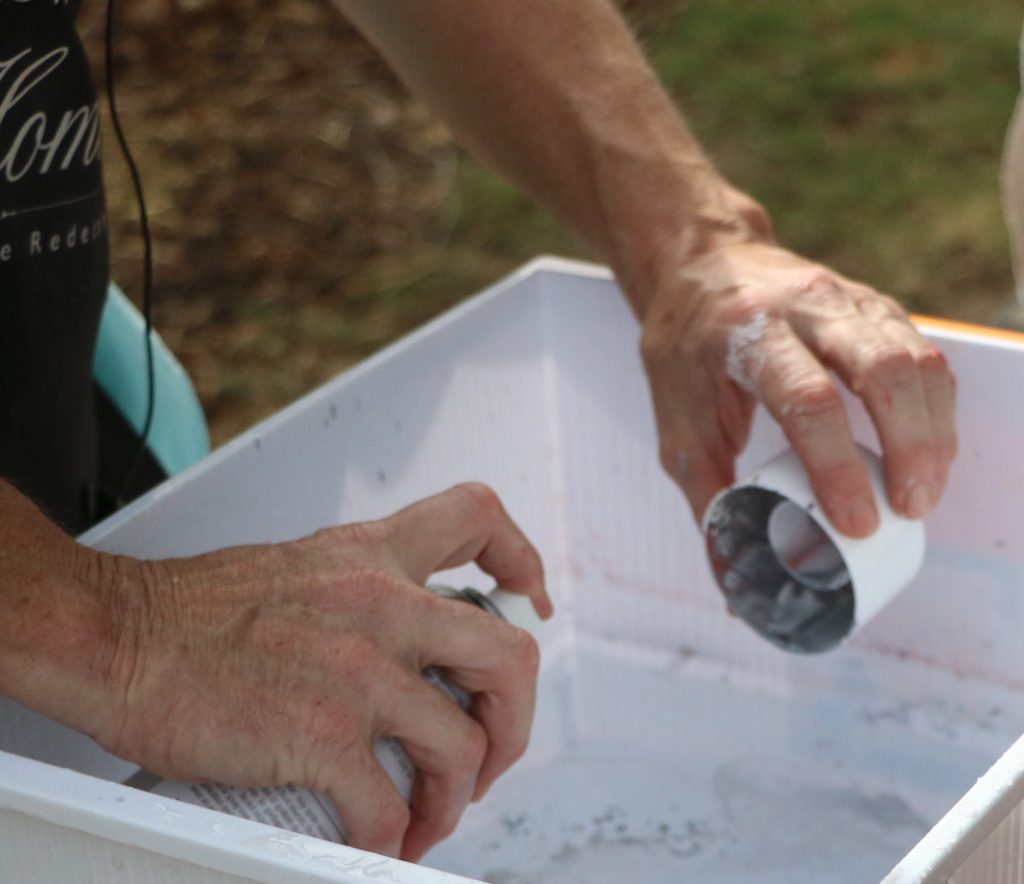 Step Four: Pour Spray Lacquer in the Water