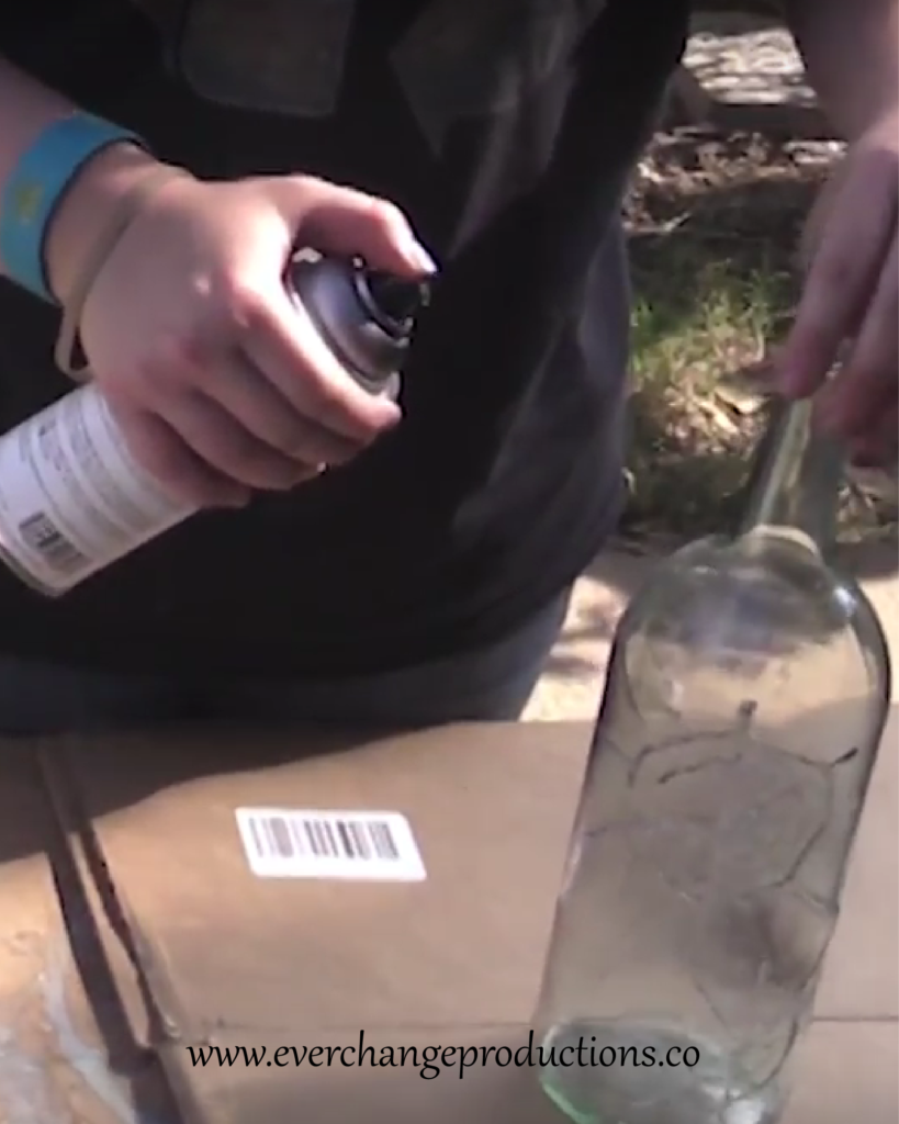 Step 3: Paint Spray the Halloween candle holders with the spray paint. 