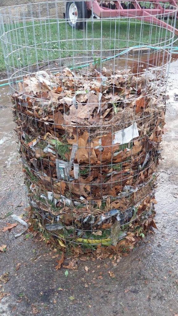 A compost bin made with garden fence wire made in a Master Composter class.