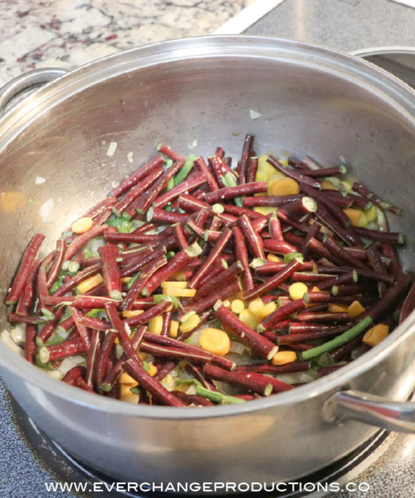 Add carrots and green beans to saute for 2 minutes