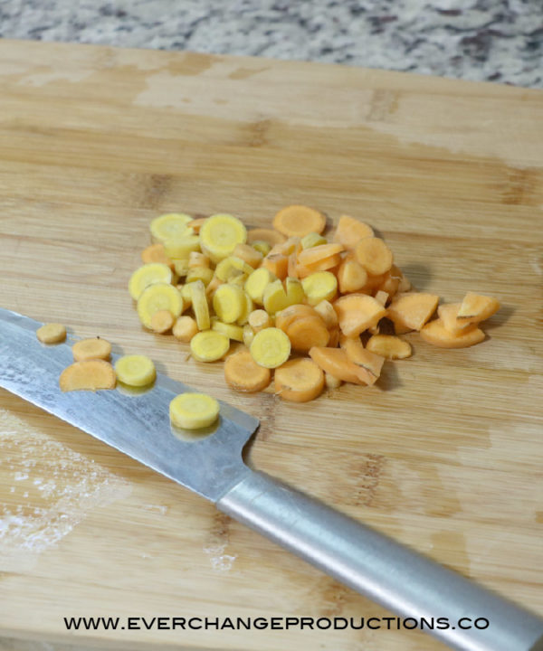 Chop veggies for summer vegetable pasta into bite sized pieces