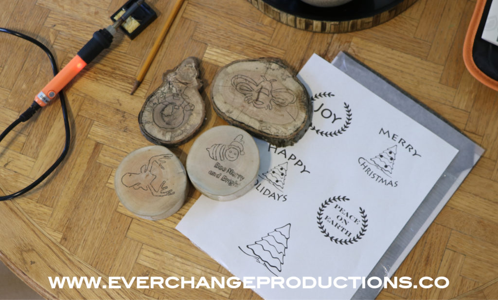 Step Two- While your wood burning tool is heating up, place one of the images onto the acrylic block. At this point, you can just stamp the image on or trace with the transfer paper. If you make your own images, make sure any writing is printed in reverse before applying the images.