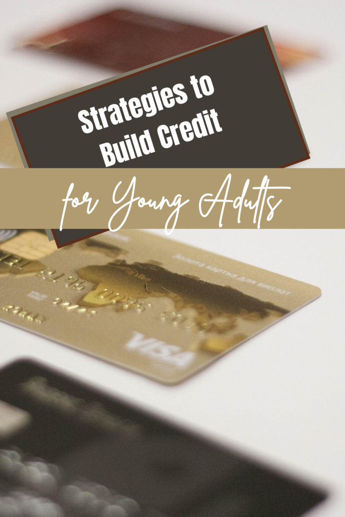 gold and blue credit cards with the title "strategies to build credit for young adults"